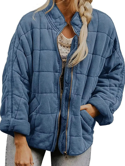 Full Size Zip Up Quilted Bomber Jacket Plus Size in blue, featuring pockets and a soft quilted design.