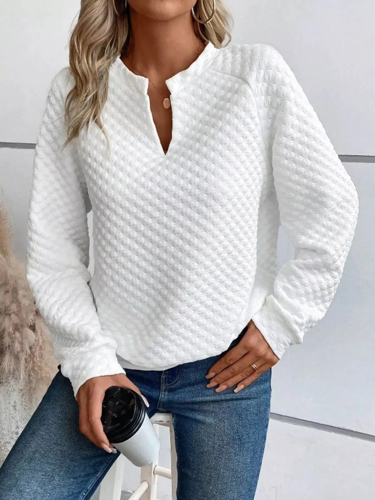 Textured Long Sleeve Notched Sweatshirt Features:Basic styleStretch:Slightly stretchyMaterial composition:95% polyester, 5% spandexCare instructions:Machine wash cold. Tumble dry low