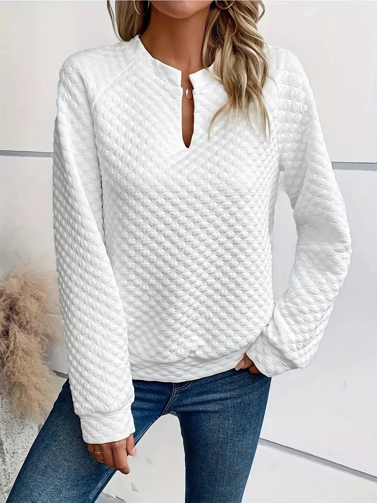Textured Long Sleeve Notched Sweatshirt Features:Basic styleStretch:Slightly stretchyMaterial composition:95% polyester, 5% spandexCare instructions:Machine wash cold. Tumble dry low 001